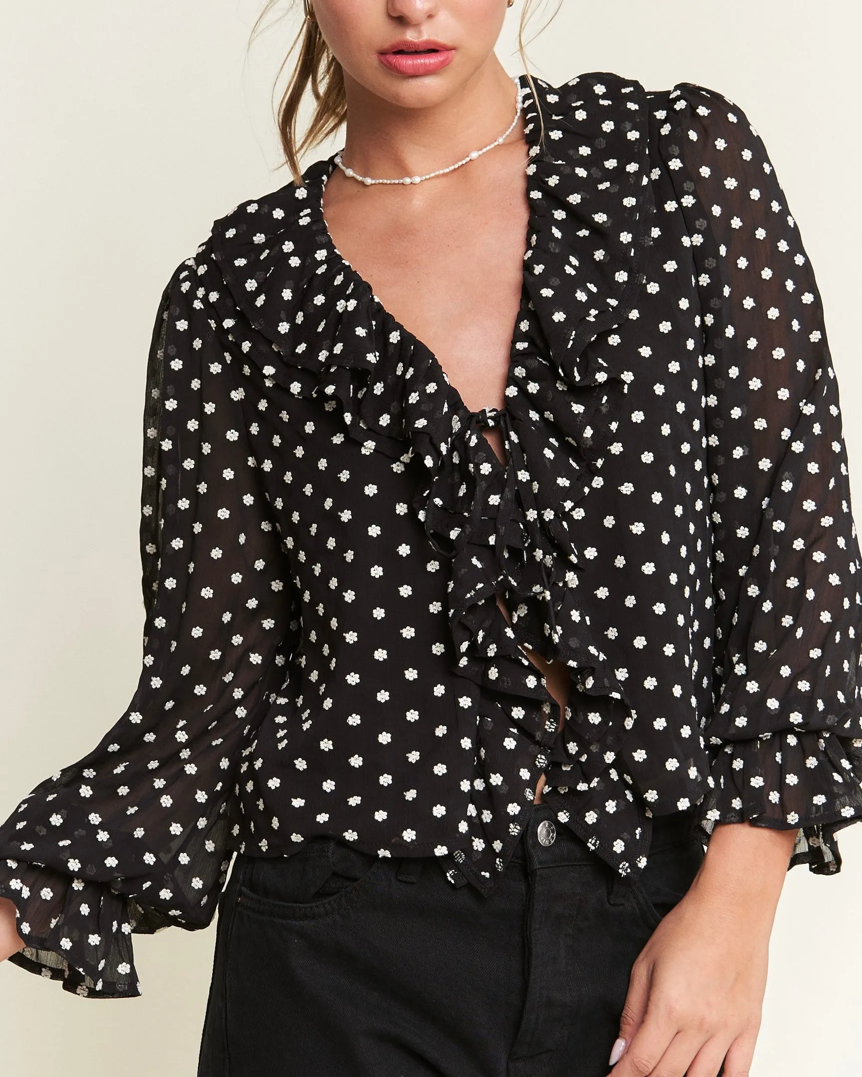 Front Tie Ruffled Semi Sheer Micro Floral Top in Black