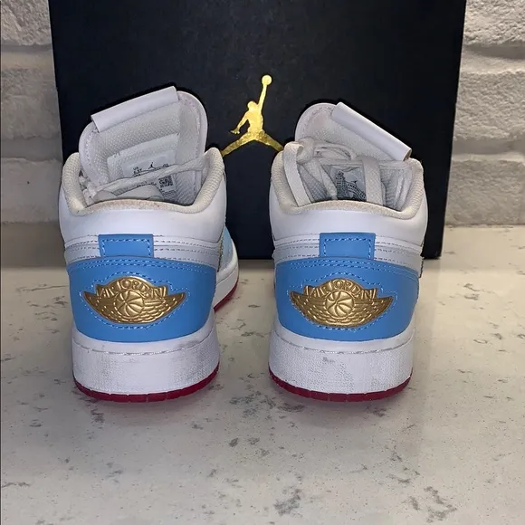 Jordan 1 Low SE &quot;White/Game Royal/University Blue&quot; Grade School Boys' Shoe