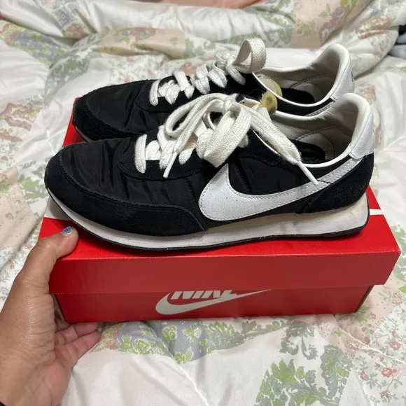 Nike size 5 youth sneakers black with white check.