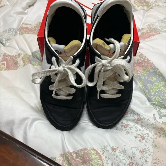Nike size 5 youth sneakers black with white check.