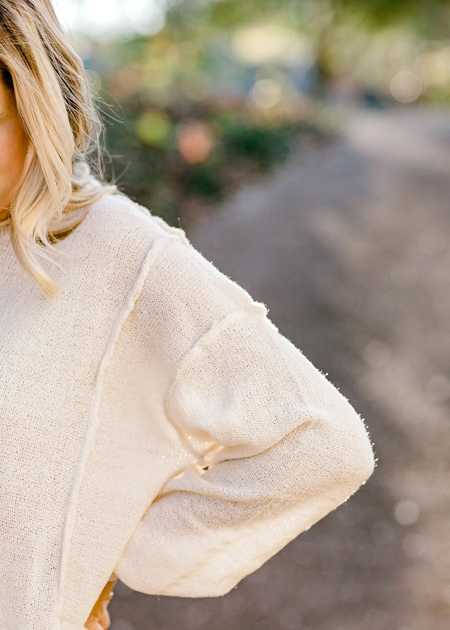 X Milky Round Neck Sweater