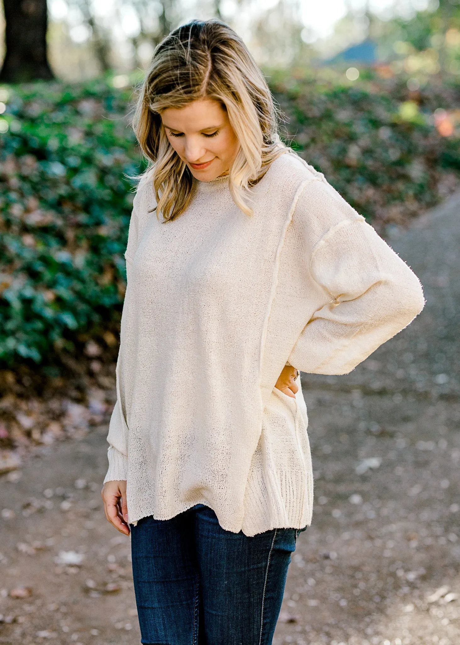 X Milky Round Neck Sweater